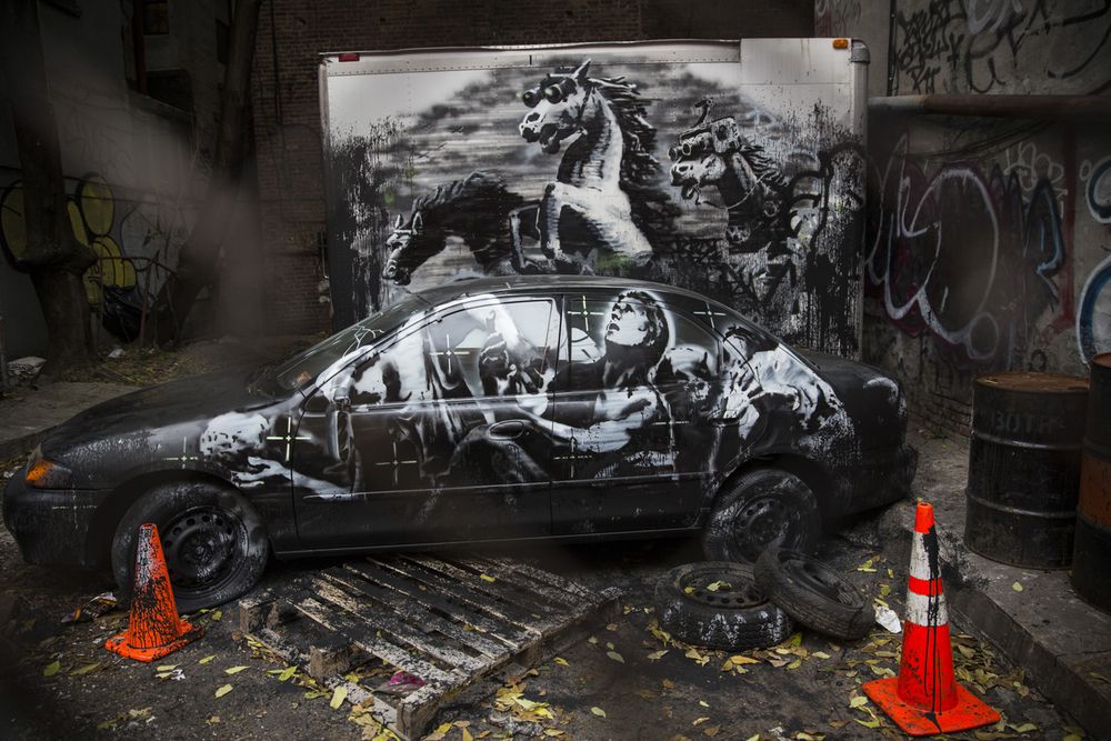 Grade: A<br/>Went up on <a href="http://gothamist.com/2013/10/09/new_dramatic_banksy_piece_goes_up_o.php#photo-1">October 9th</a><br/>Located on Ludlow and Stanton<br/>(Photo via Getty)